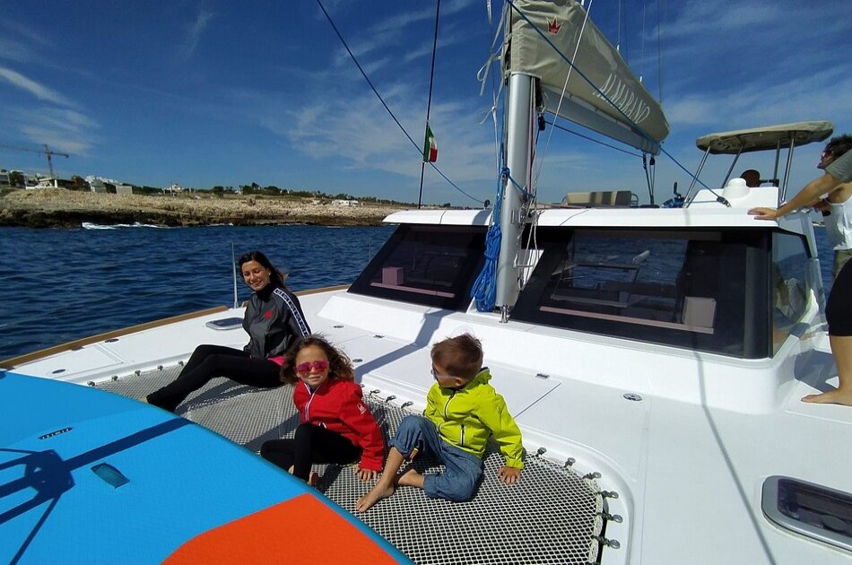 Catamaran sail tour to the caves of Polignano a Mare
